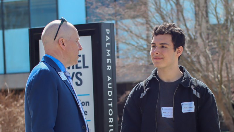 Prospective student talking with the Director of Admissions