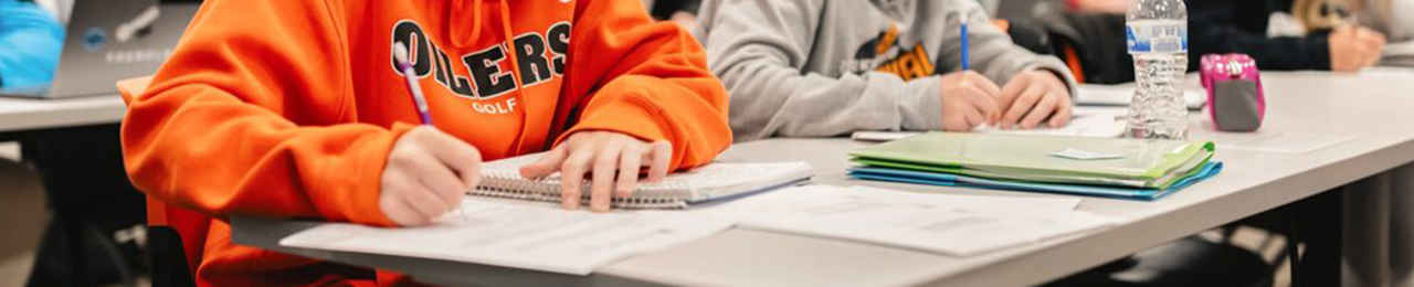 students working at a desk