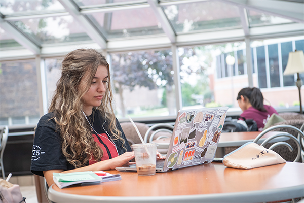 student studying with coffee 