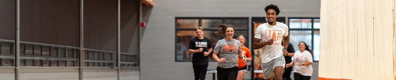Students running on track