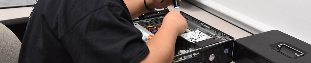 student repairing a pc