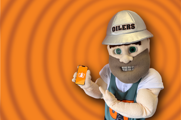Photo of Derrick the Oiler in front of Old Main