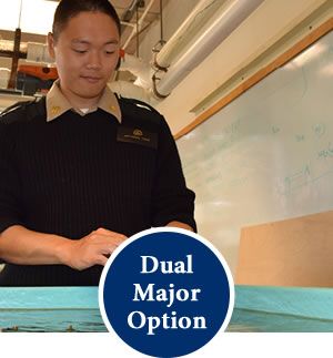 Student at touch tank