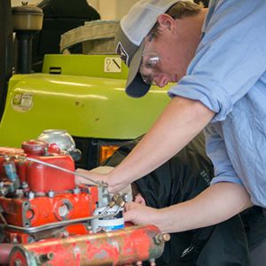 Student working on engine