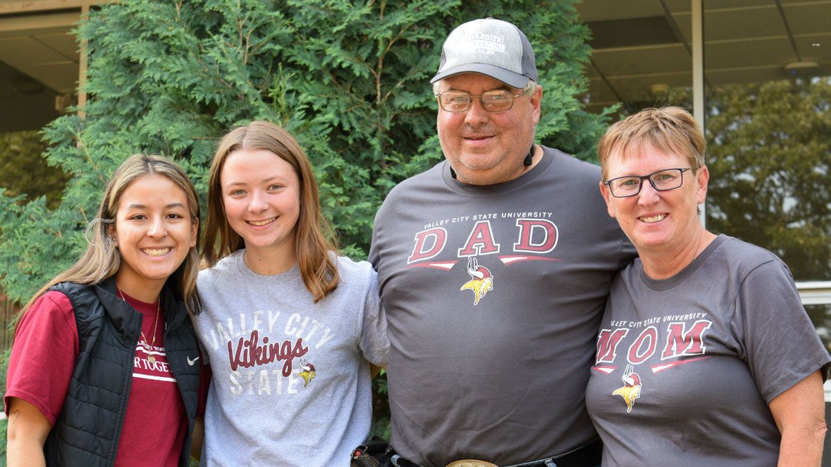 Photo of VCSU family members with their student on move in day.