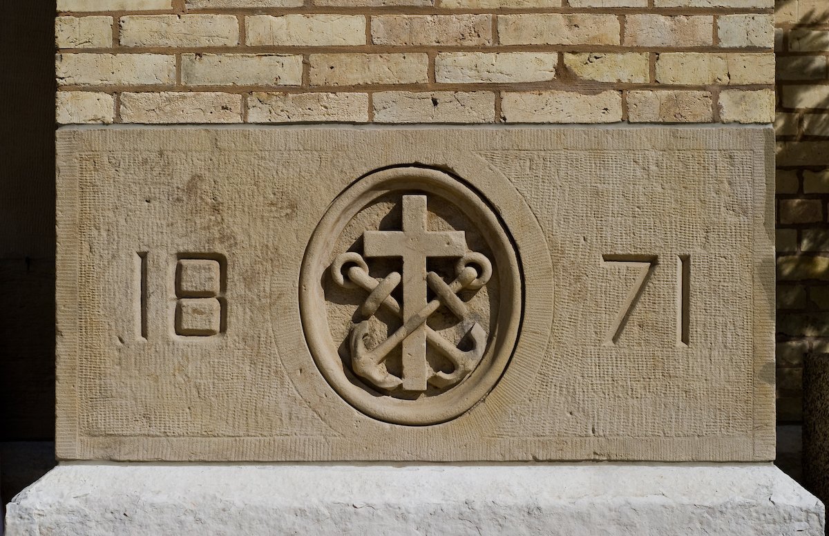 The Congregation of Holy Cross Coat of Arms in the Basilica cornerstone