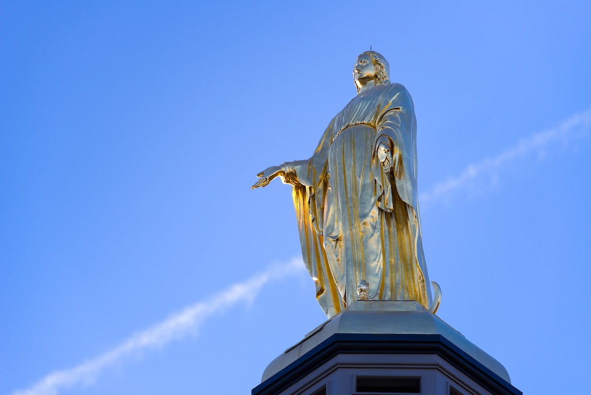 Statue of the Blessed Virgin Mary atop the Main Building