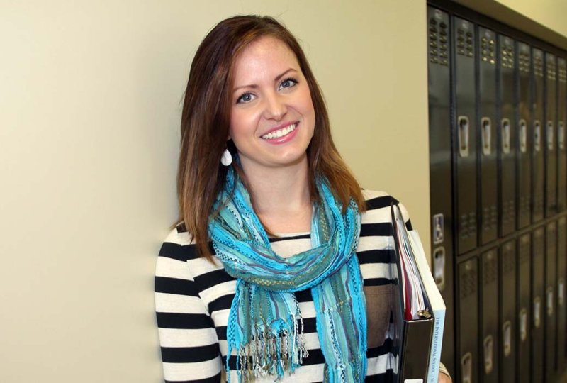 Image of a student looking at the camera smiling