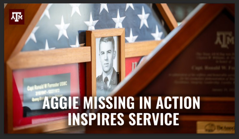 A black-and-white photo of Craig Forrester in front of a framed, folded United States flag. Text reads "Aggie Missing In Action Inspires Service".
