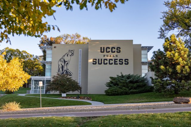 "UCCS Fuels Success" Mural on the side of Cragmor