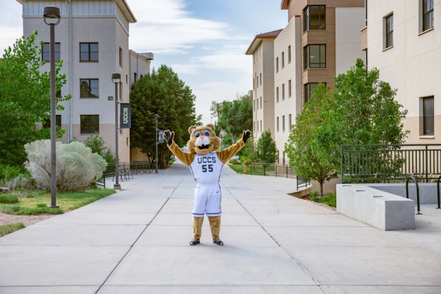 Clyde standing in Summit Village