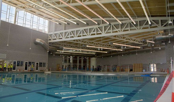 The large indoor pool offers lap training, classes, and even an occasional Dive-In Movie.