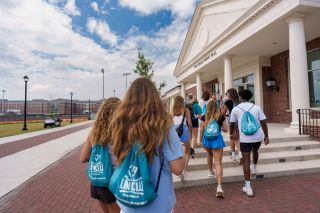 Students walk into the Shore Dining Hall