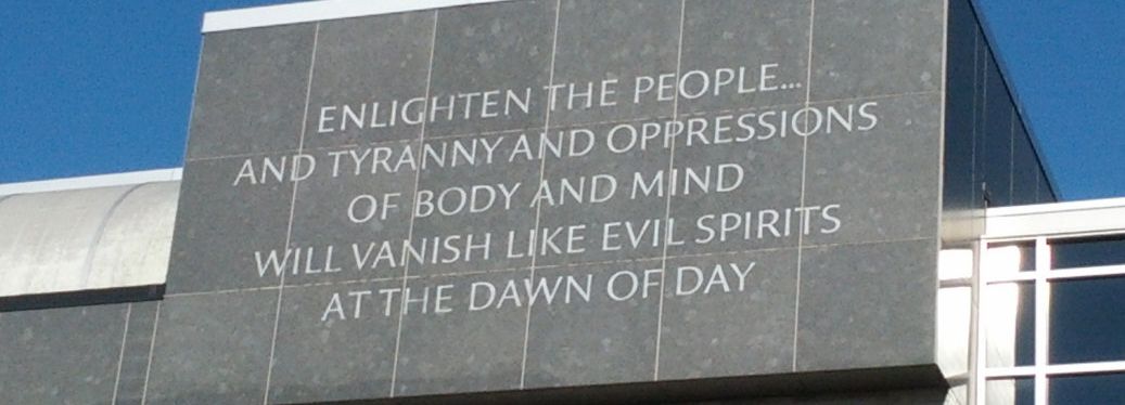 Engraved Thomas Jefferson quote on library exterior: "Enlighten the people generally, and tyranny and opressions of the body and mind will vanish like evil spirits at the dawn of day.\"