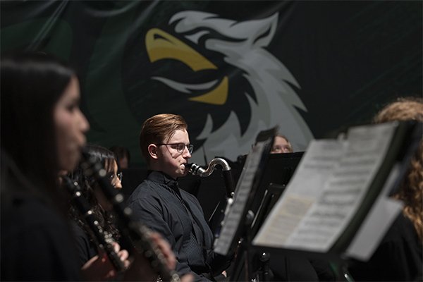 Students playing instruments at a Charter Day celebration.