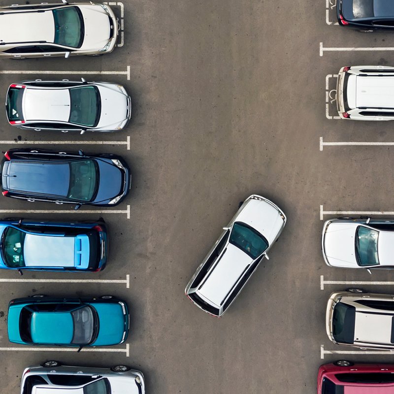 Cars in parking spaces.