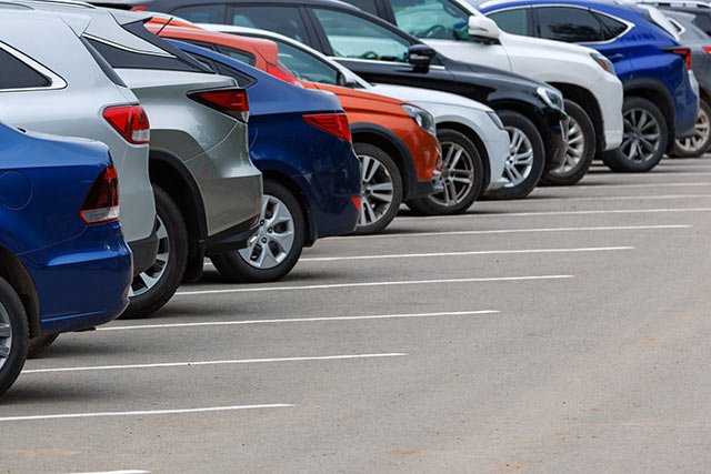 Cars in parking spaces.