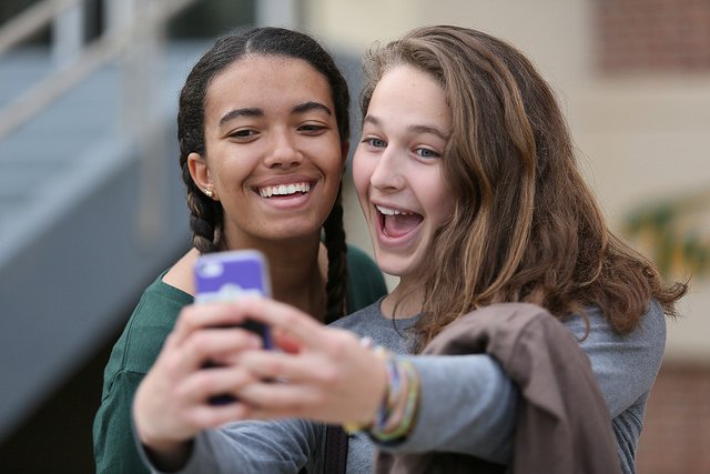 Students taking a selfie.