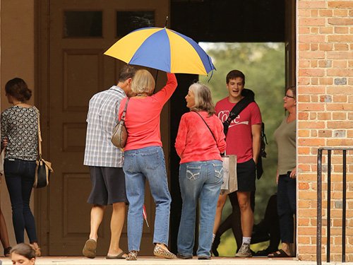 People under an umbrella