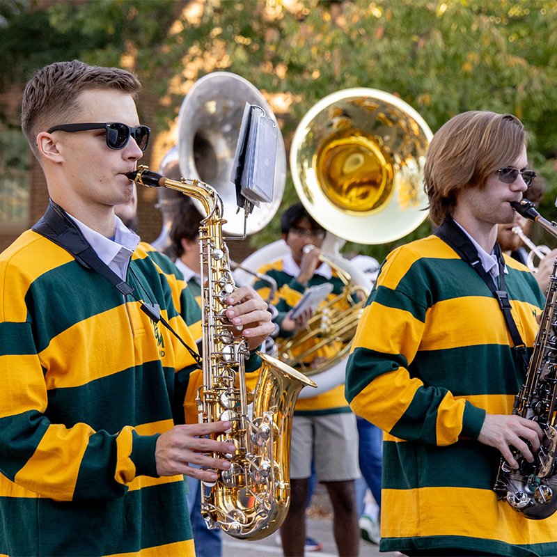 Students playing instruments during the Homecoming Parade
