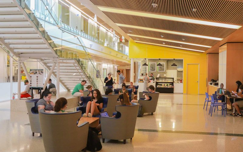 People sitting inside the Integrated Science Center