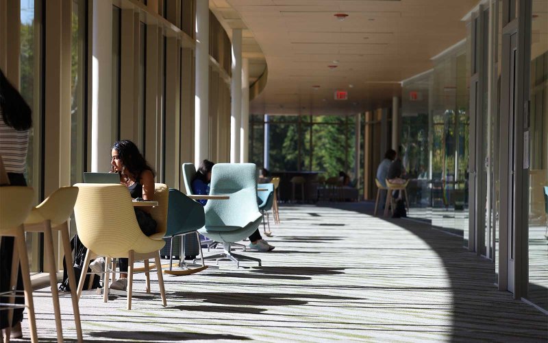 Students sitting inside Sadler Center