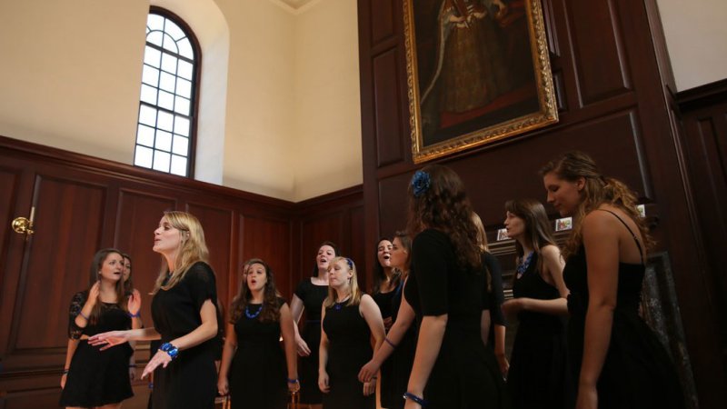 Singers performing a capella inside the Wren Building